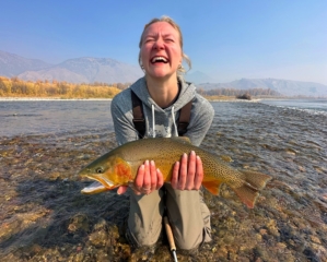 Alina on the Snake River with a beautiful October Cutthroat trout